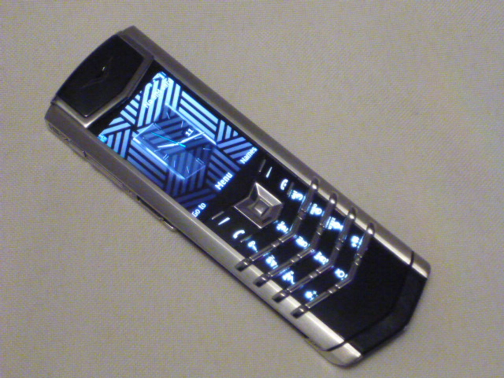 Vertu Signature S Phone, Brushed Stainless Steel with Black Leather Back. S/N S-000075. Comes in Box