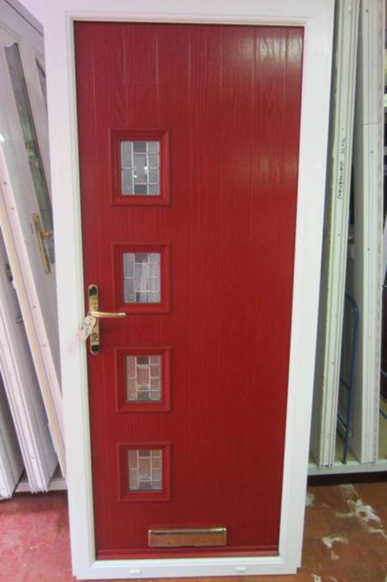 Ex Showroom Display Composite Front Door & Frame. External Finish in Dark Red Wood Grain, Internal