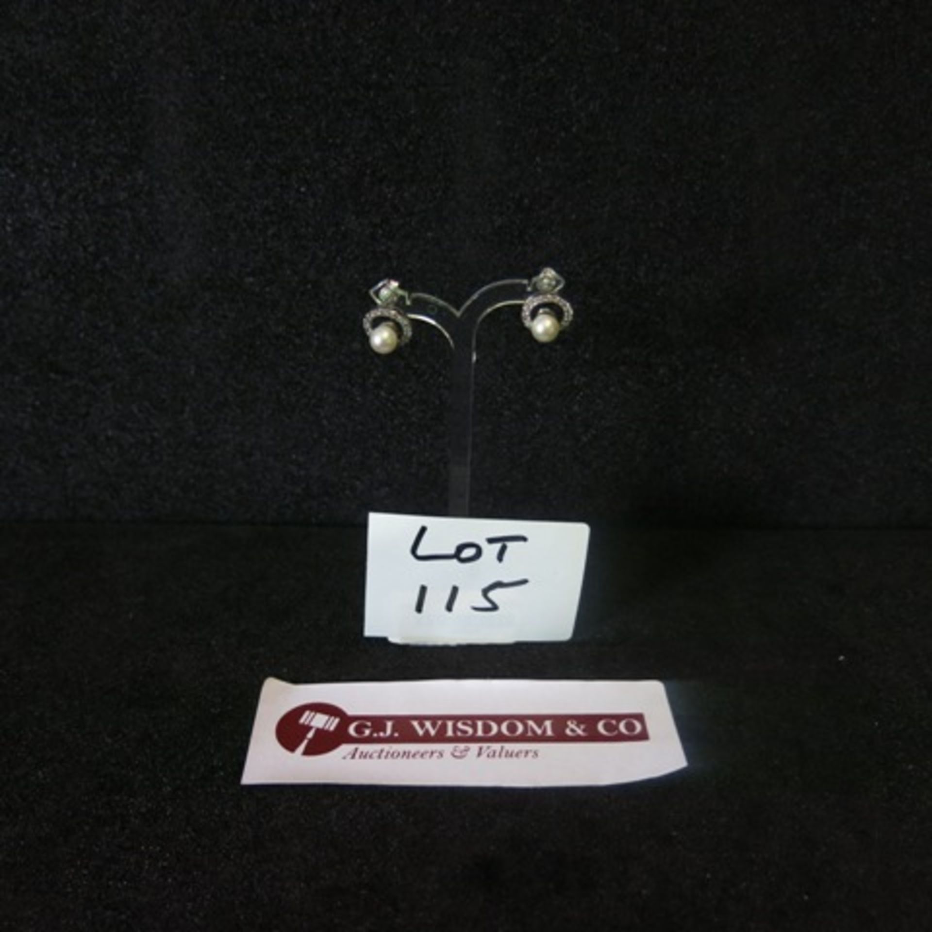 Pair of Pearl Stud Earrings with White Metal & Clear Stone Surround. RRP £178.00