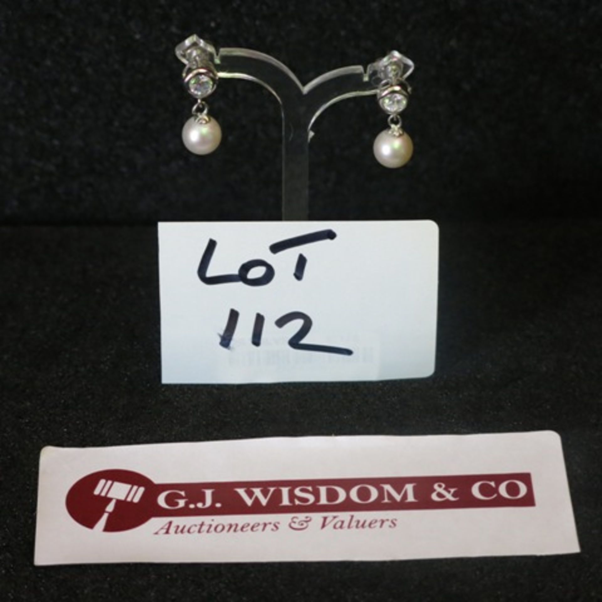 Pair of Pearl Drop Earrings with White Metal and Single Large Clear Stone. RRP £178.00