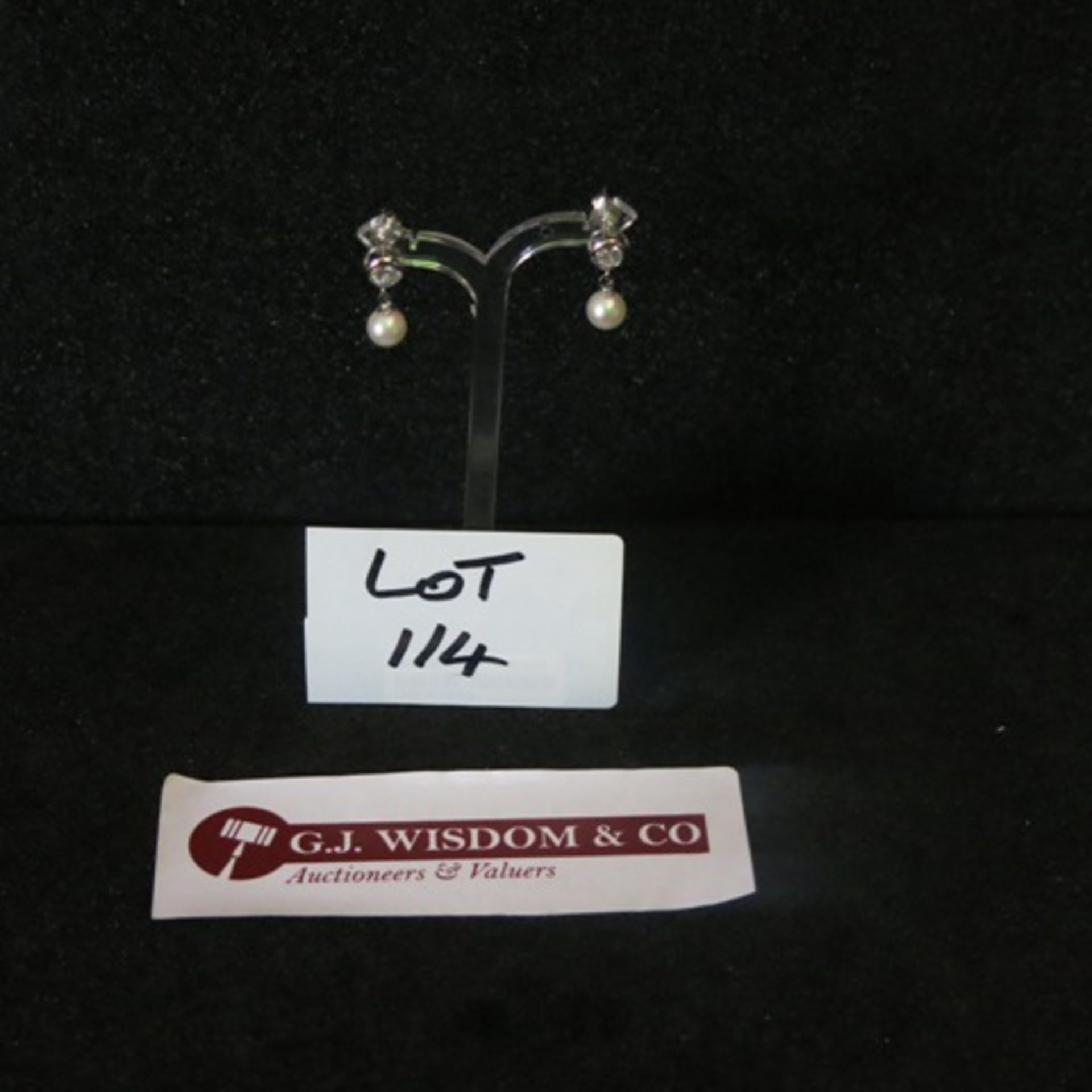 Pair of Pearl Drop Earrings with White Metal and Single Large Clear Stone. RRP £178.00