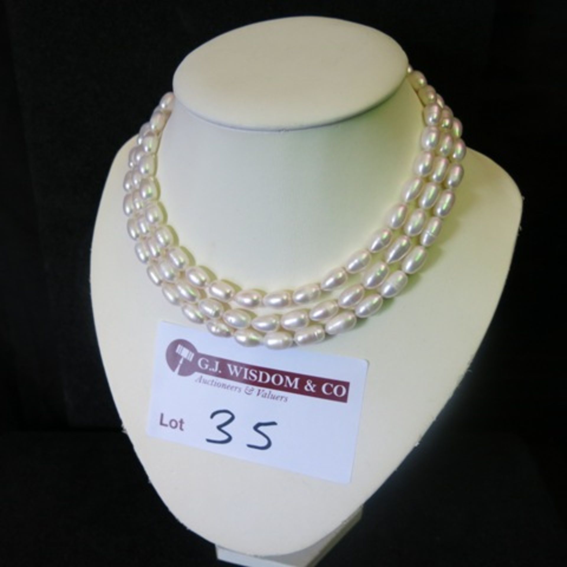Triple Band Oval Pearl Necklace (8x13.5mm). RRP £398.00