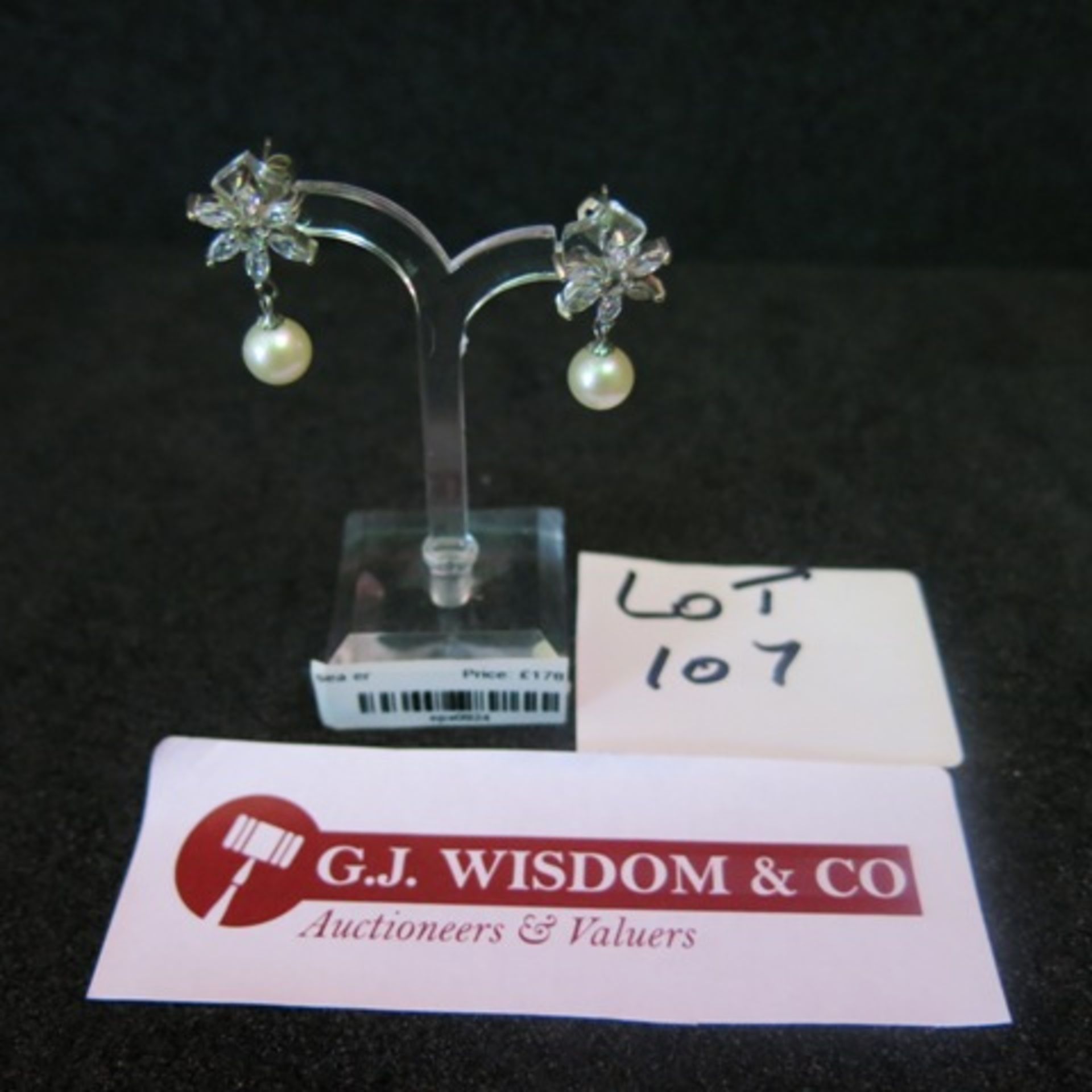 Pair of Pearl 7.5mm Drop Earrings with White Metal & Clear Stone Flower Petal Motif Over the