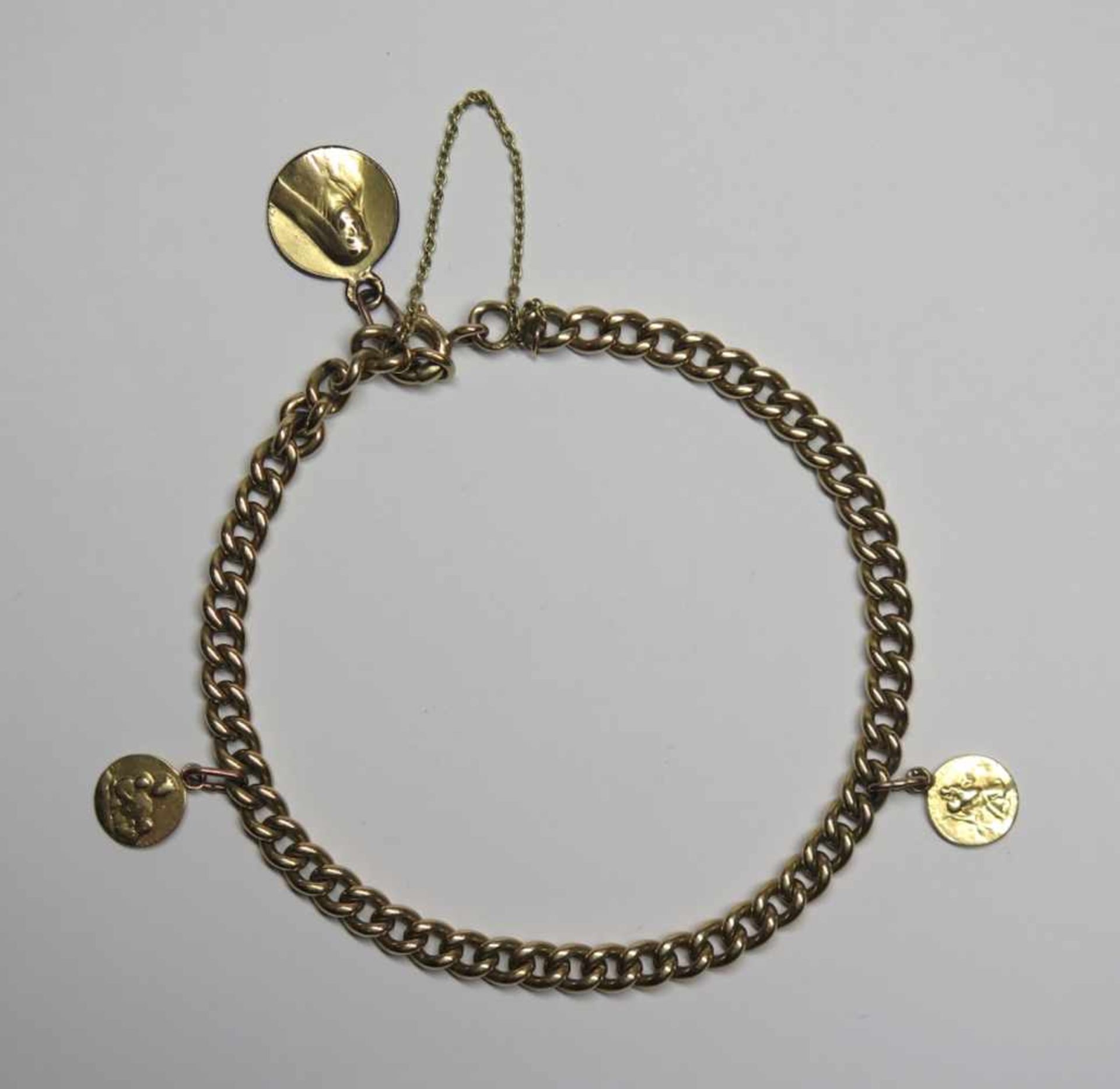Bracelet et breloques, anciens.(long. env. 20.5 cm, poids total: env. 18.4 g). En or jaune 750 (sauf