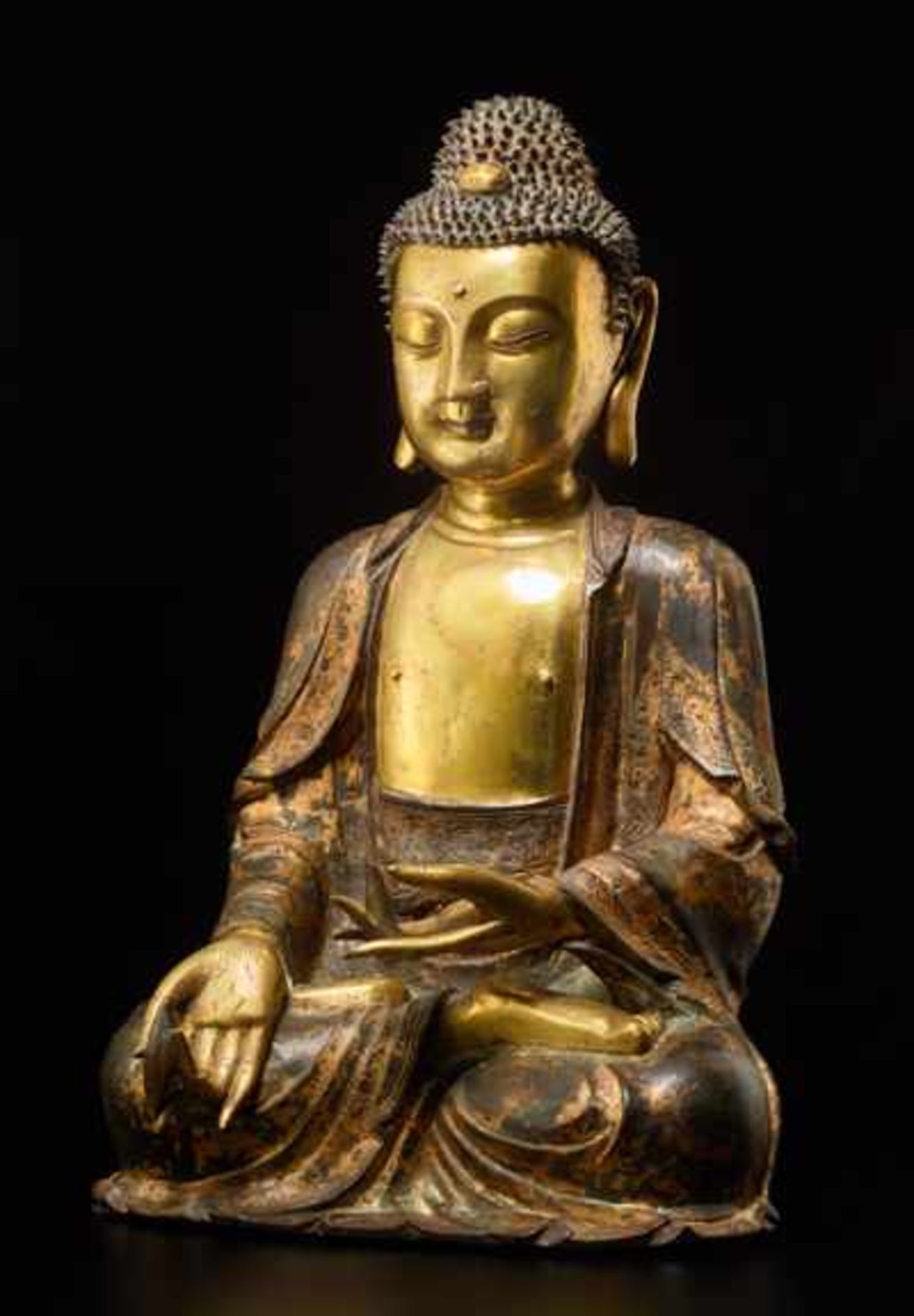 EINE TEILWEISE FEUERVERGOLDETE BRONZE DES MEDIZINBUDDHA BHAISHAJYAGURU Bronze mit Feuervergoldung