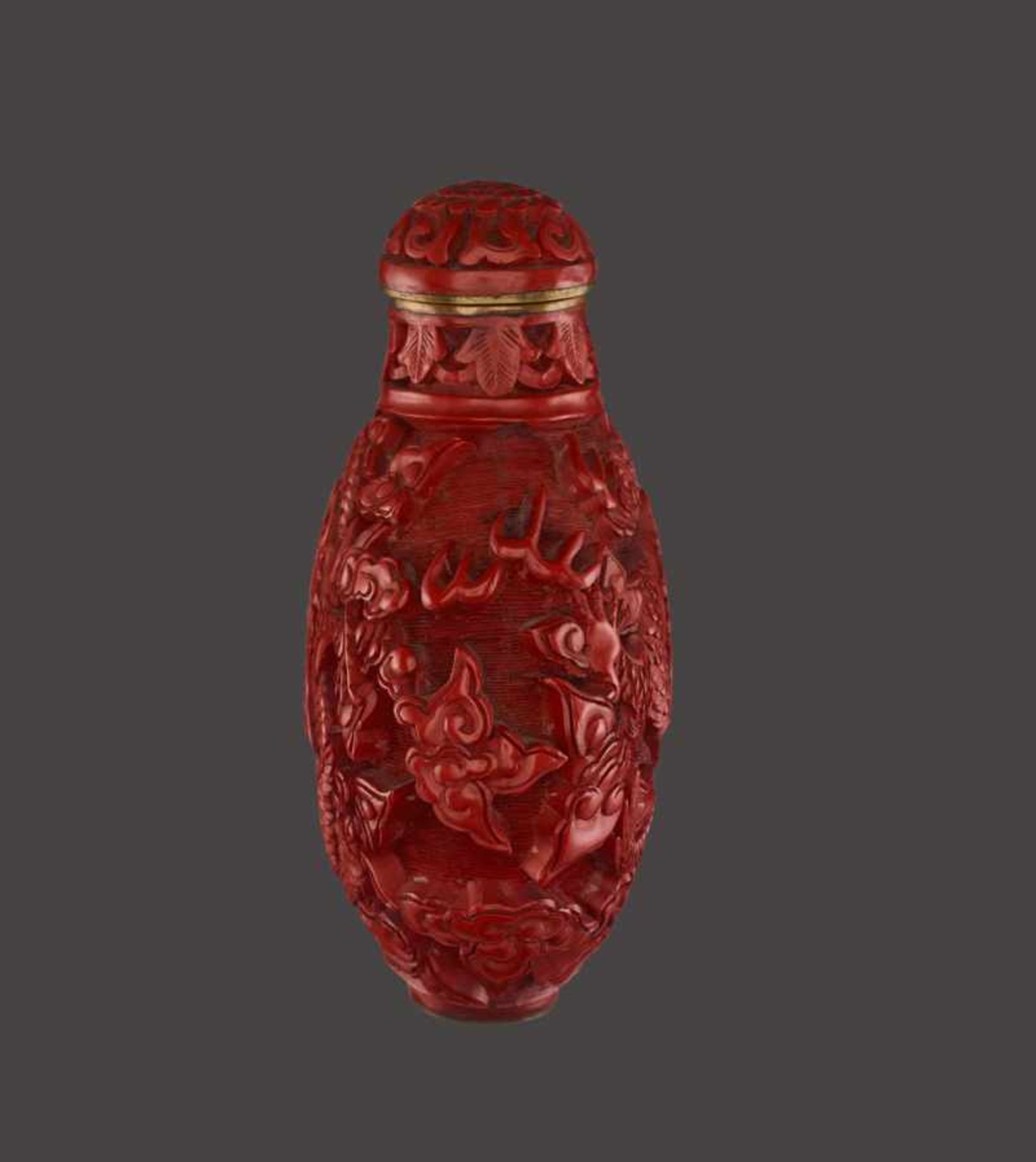 A CINNABAR LACQUER ‘DRAGON’ SNUFF BOTTLE Cinnabar lacquer in high relief on bronze body. China, late - Image 4 of 6