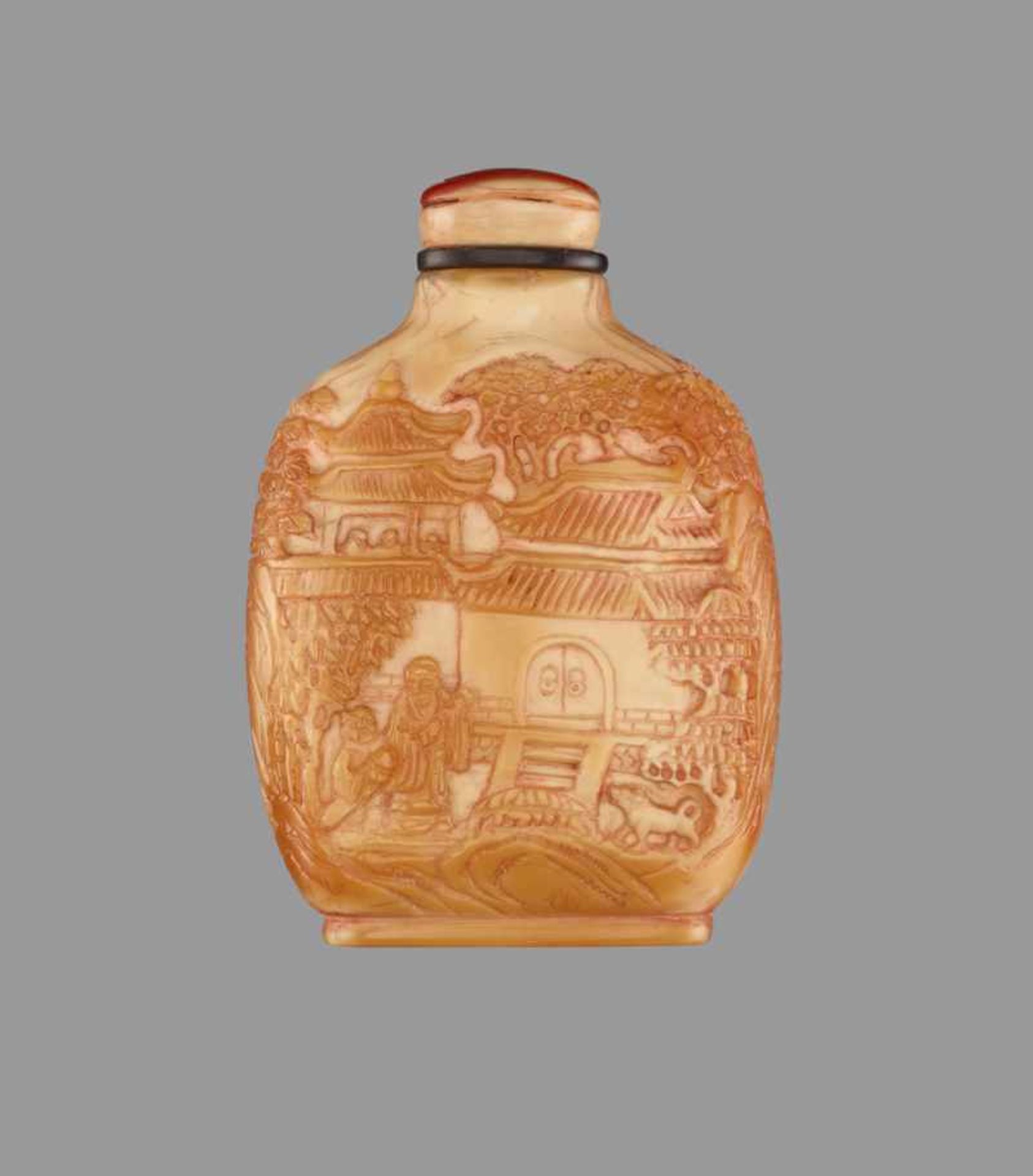 A CARVED HORNBILL SNUFF BOTTLE Hornbill of even ivory color with layers of elegant golden-brown