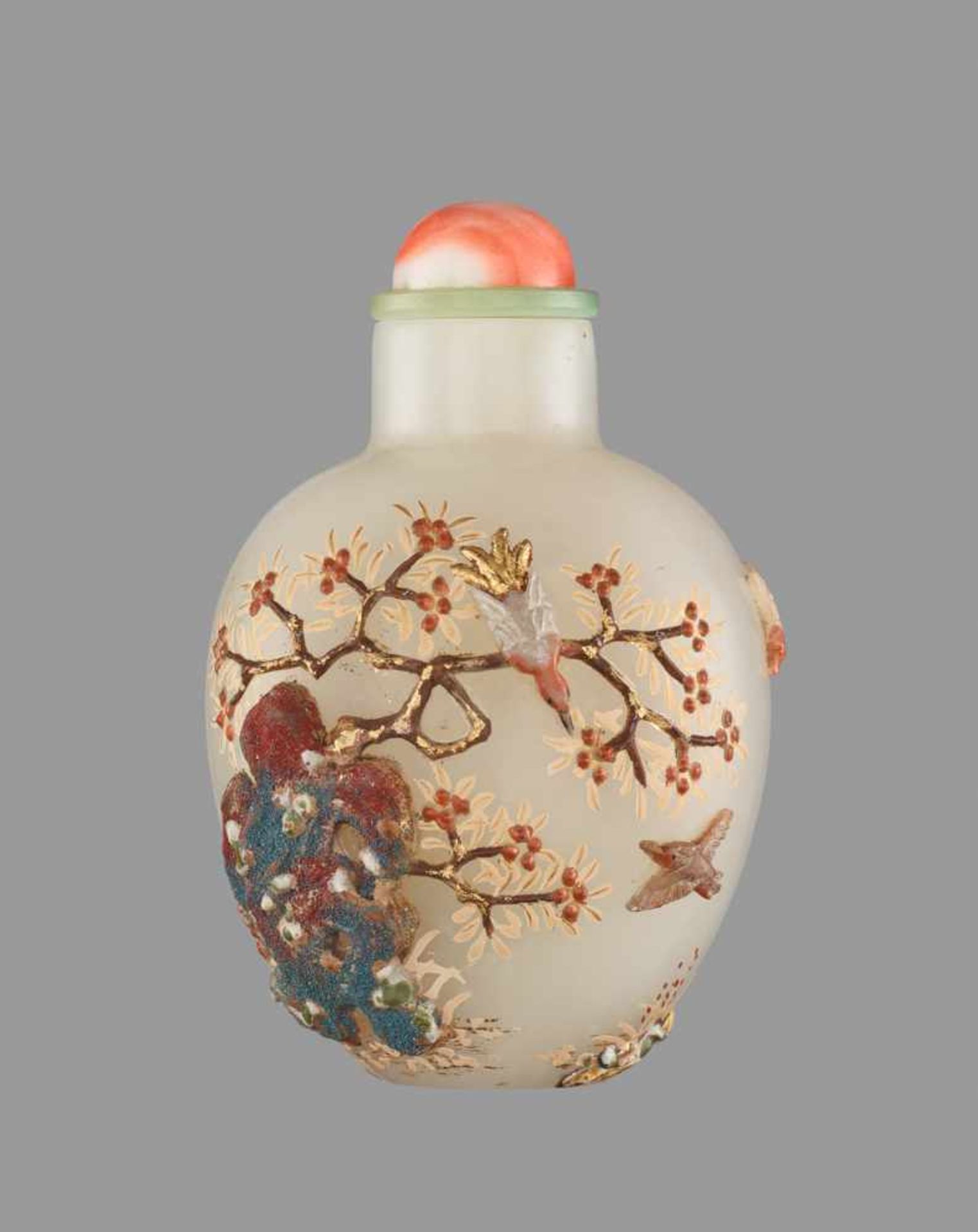 AN EMBELLISHED AND INSCRIBED PALE CELADON JADE “FLOCK OF BIRDS” SNUFF BOTTLE Pale celadon nephrite