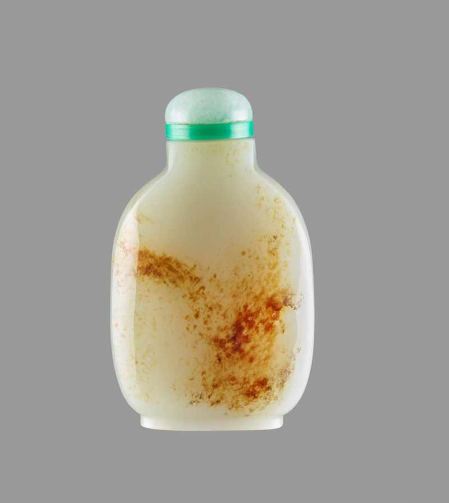 A PLAIN WHITE AND RUSSET JADE SNUFF BOTTLE White nephrite with clouds of russet, good hand polish.