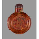 A ‘REALGAR’ GLASS SNUFF BOTTLE Opaque glass in imitation of realgar, with a color scheme typical for