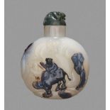 A 'SUZHOU' AGATE SNUFF BOTTLE Chalcedony, the stone of a pale translucent gray with dark brown