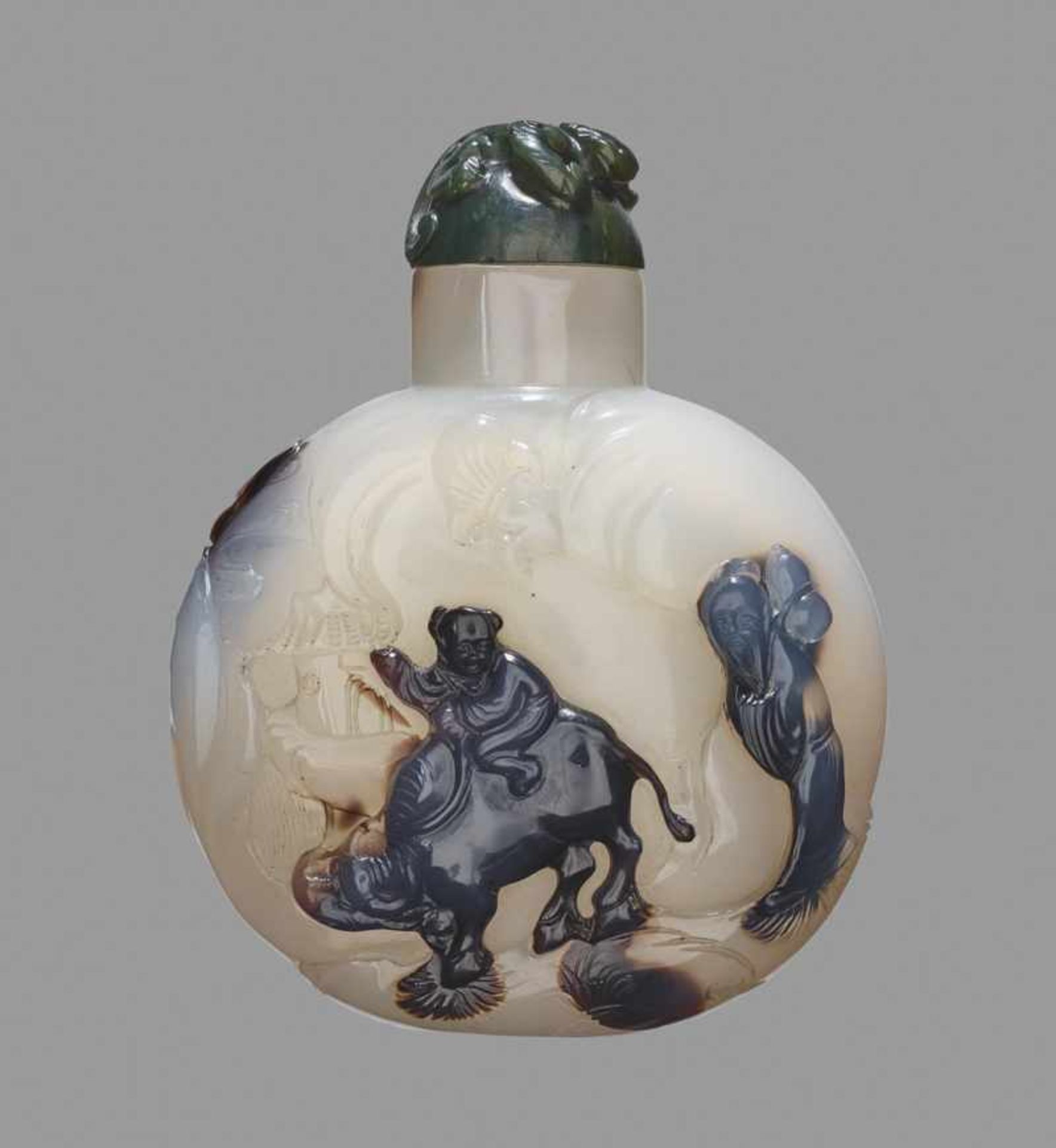 A 'SUZHOU' AGATE SNUFF BOTTLE Chalcedony, the stone of a pale translucent gray with dark brown