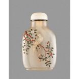 AN EMBELLISHED 'EXOTIC BIRD' CHALCEDONY SNUFF BOTTLE Chalcedony of even caramel tone, with smooth