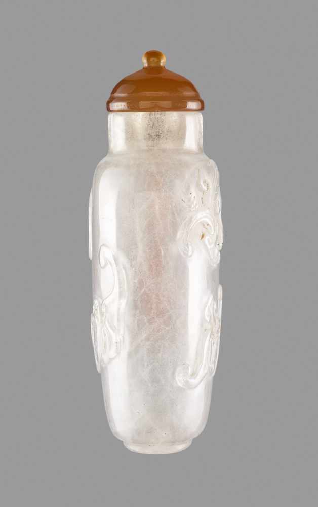 A ROCK CRYSTAL ‘BATS AND QILONG’ SNUFF BOTTLE, QING DYNASTY Clear rock crystal, with a cloudy ‘ice - Image 3 of 6