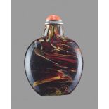 A YELLOW AND BROWN SANDWICHED GLASS SNUFF BOTTLE, QING DYNASTY Glass. One layer of mottled maroon,