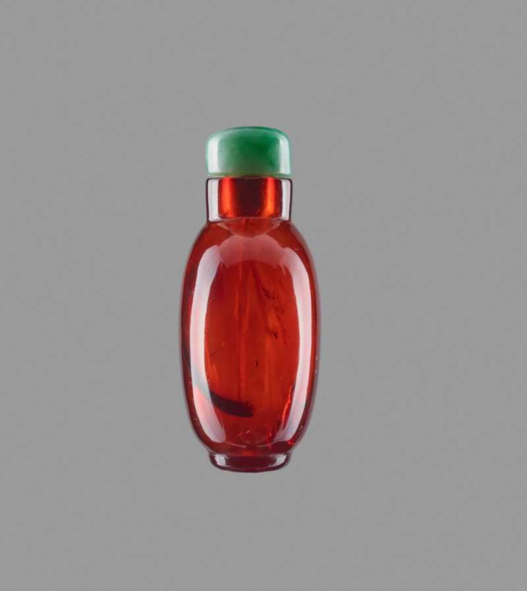 A SMALL PLAIN AMBER SNUFF BOTTLE Transparent amber of even golden-brown color, with a few smaller - Image 3 of 6