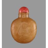 A BUTTERSCOTCH AGATE ‘LOTUS’ SNUFF BOTTLE, QING DYNASTY Semi-translucent agate of natural even