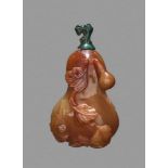 A CARVED AGATE 'DOUBLE GOURD' SNUFF BOTTLE, QING DYNASTY Agate, of even honey tone, with smooth hand