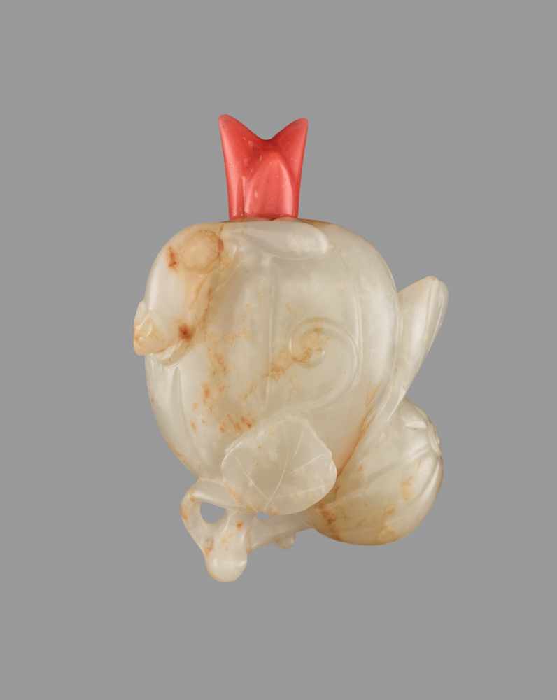 A NEPHRITE 'SQUIRREL AND MELON' SNUFF BOTTLE, 1770-1870 Nephrite of celadon color with russet