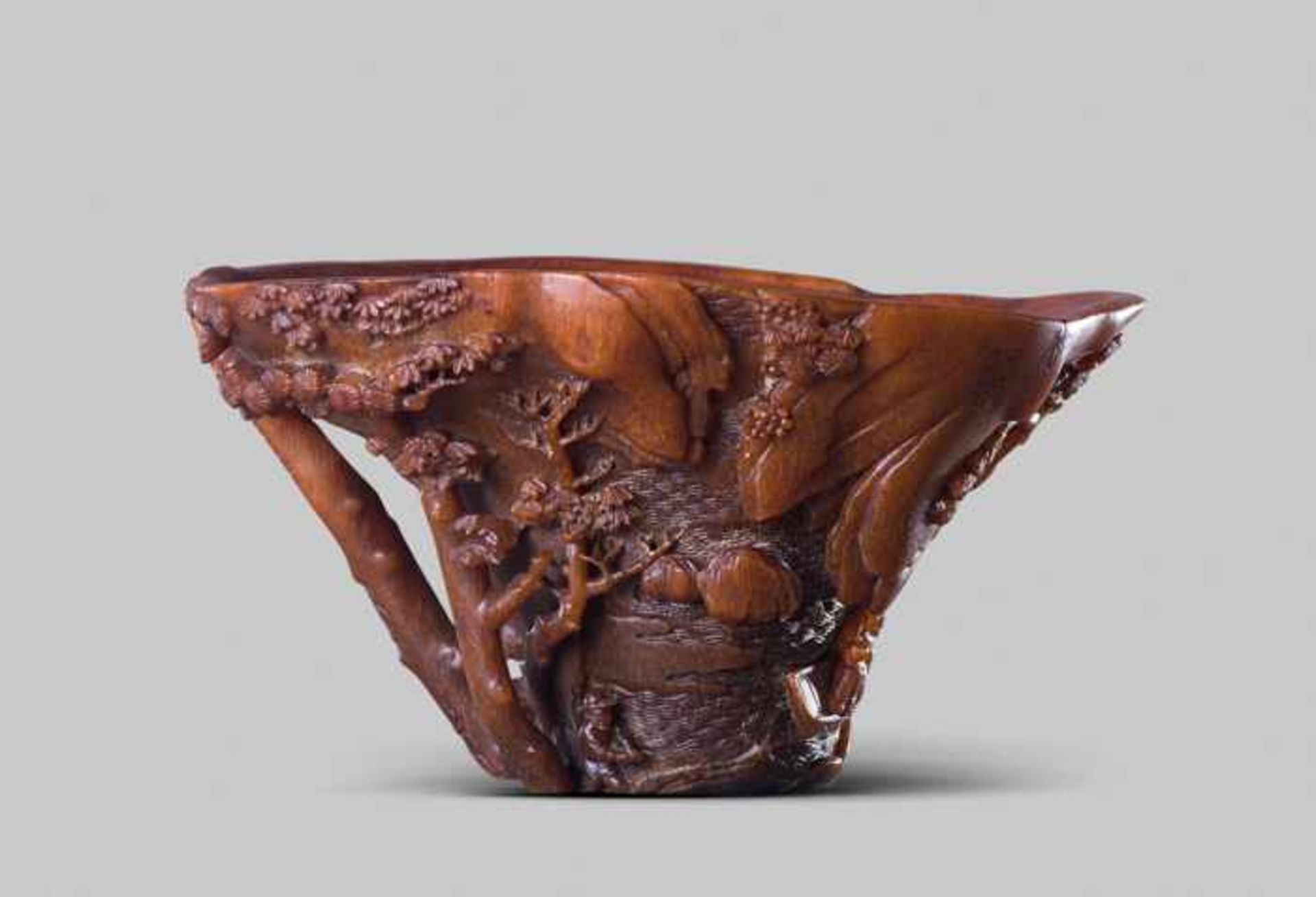 A SIGNED RHINOCEROS HORN 'LANDSCAPE' LIBATION CUP, SCHOOL OF ZHOU WENSHU, 17TH CENTURY The horn of - Image 3 of 5