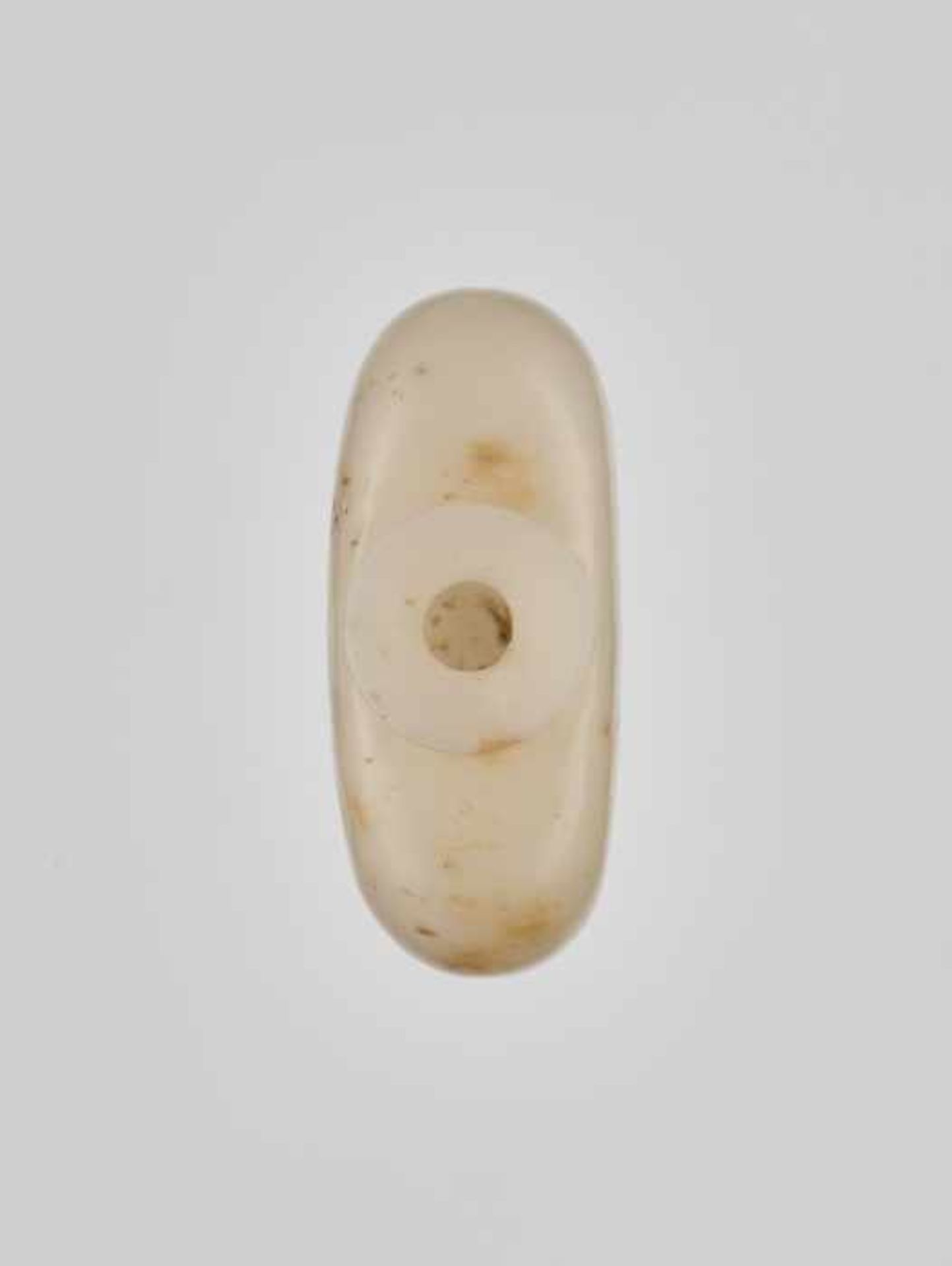 A PLAIN WHITE AND RUSSET CALCITE BOTTLE, 1780-1860 Opaque white calcite with russet streaks and - Image 5 of 6