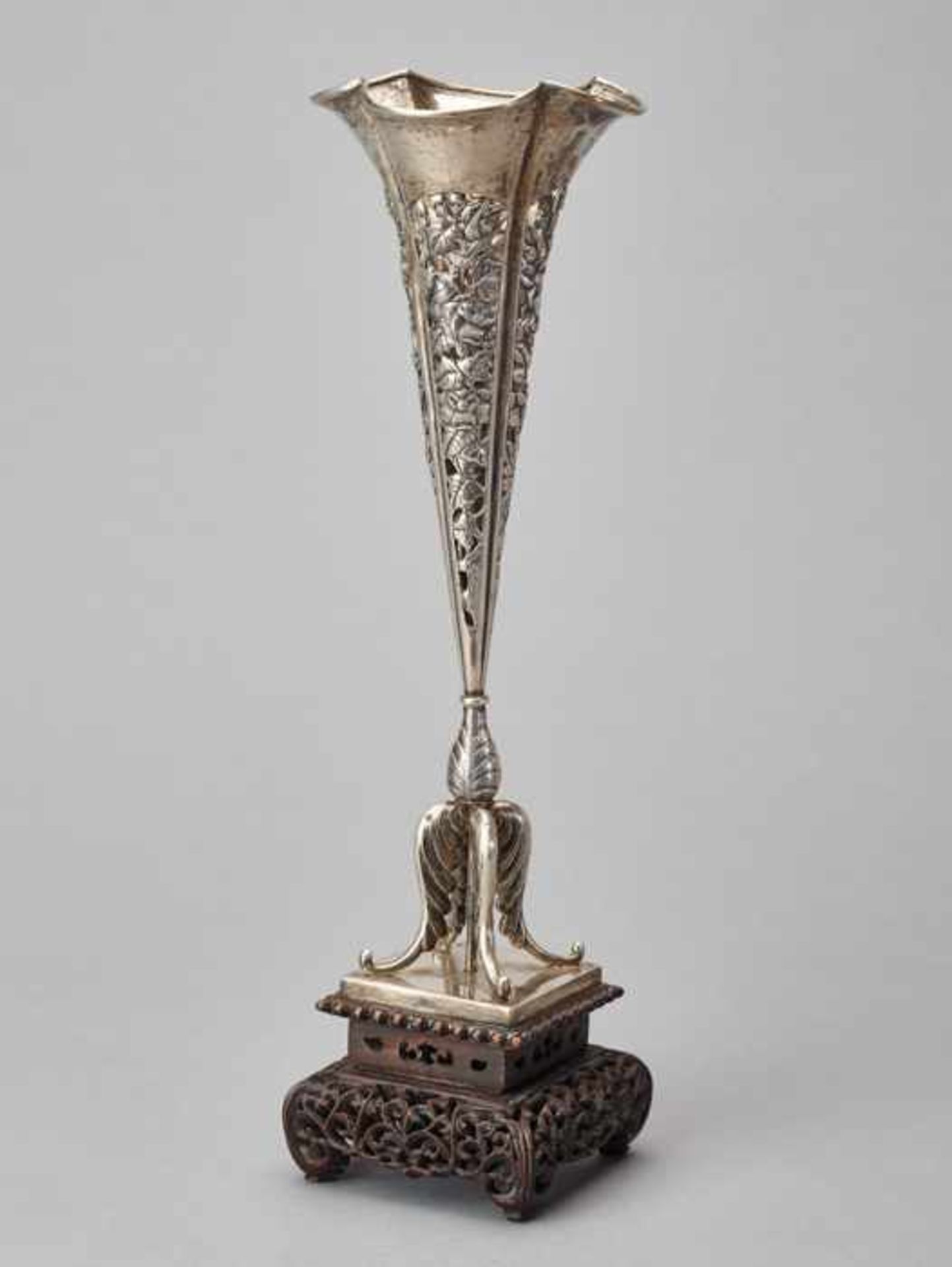 A WO SHING EXPORT SILVER TRUMPET VASE WITH DRAGON, 1880s Silver with chase work and reticulation,