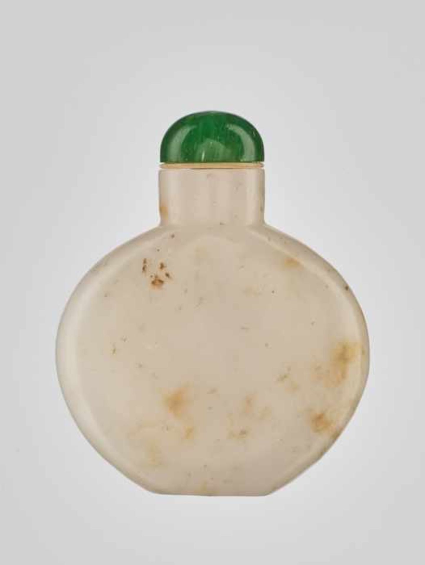 A PLAIN WHITE AND RUSSET CALCITE BOTTLE, 1780-1860 Opaque white calcite with russet streaks and