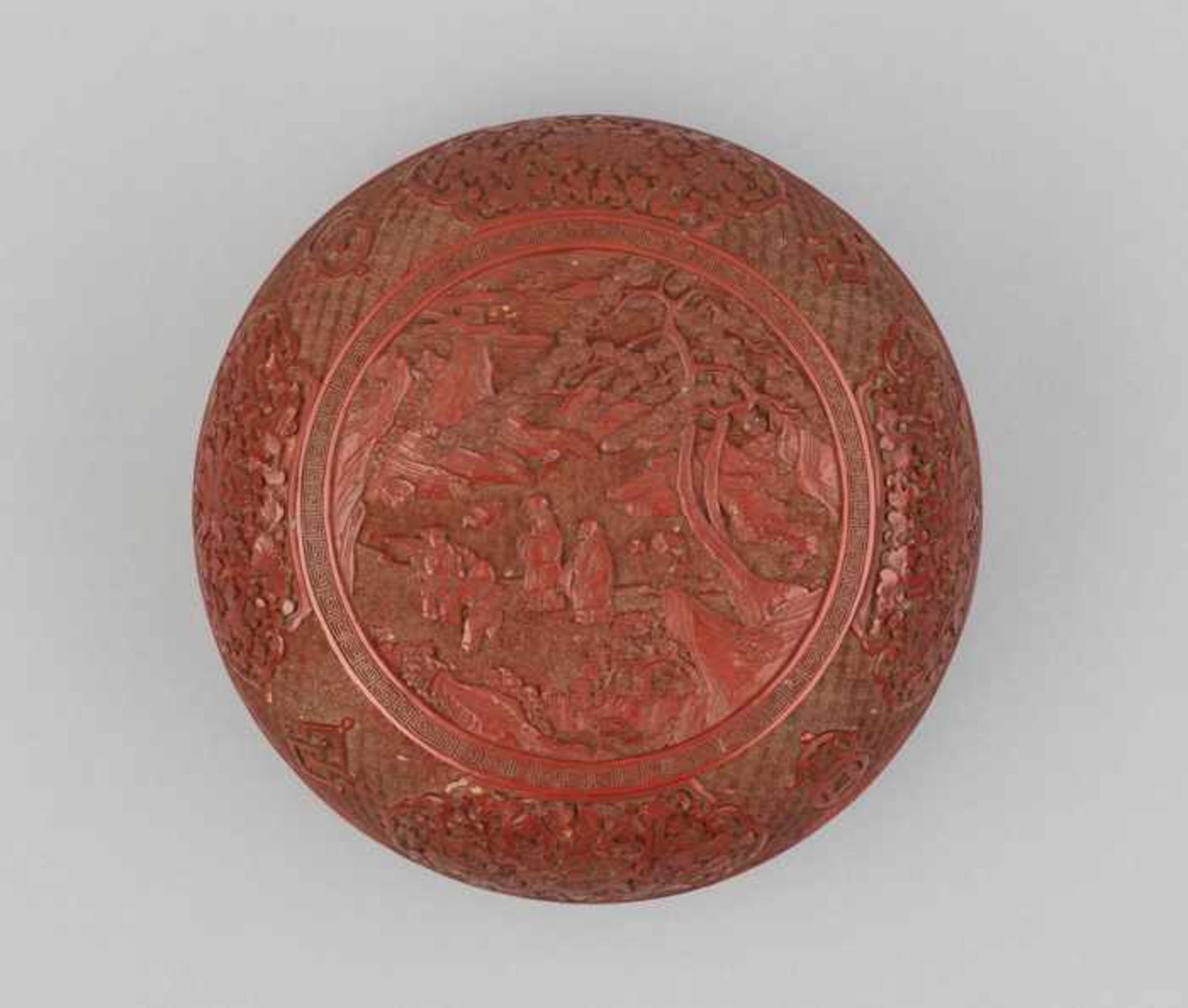 A ‘SCHOLARS AND PUPILS’ CINNABAR LACQUER BOX, 17th-18th CENTURY Massive and heavy cast metal box