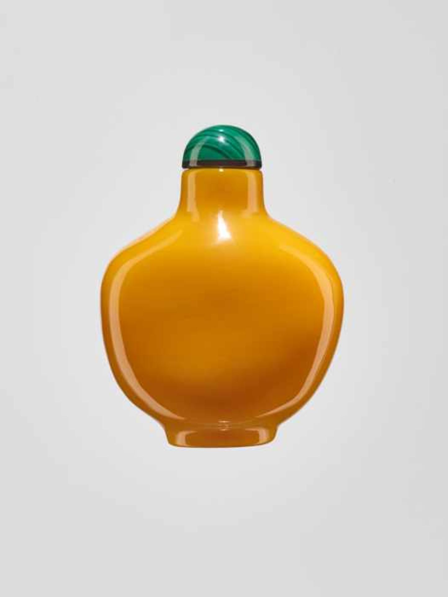 AN ‘IMPERIAL’ YELLOW BEIJING GLASS SNUFF BOTTLE, 19th CENTURY Opaque glass of intense and rich egg