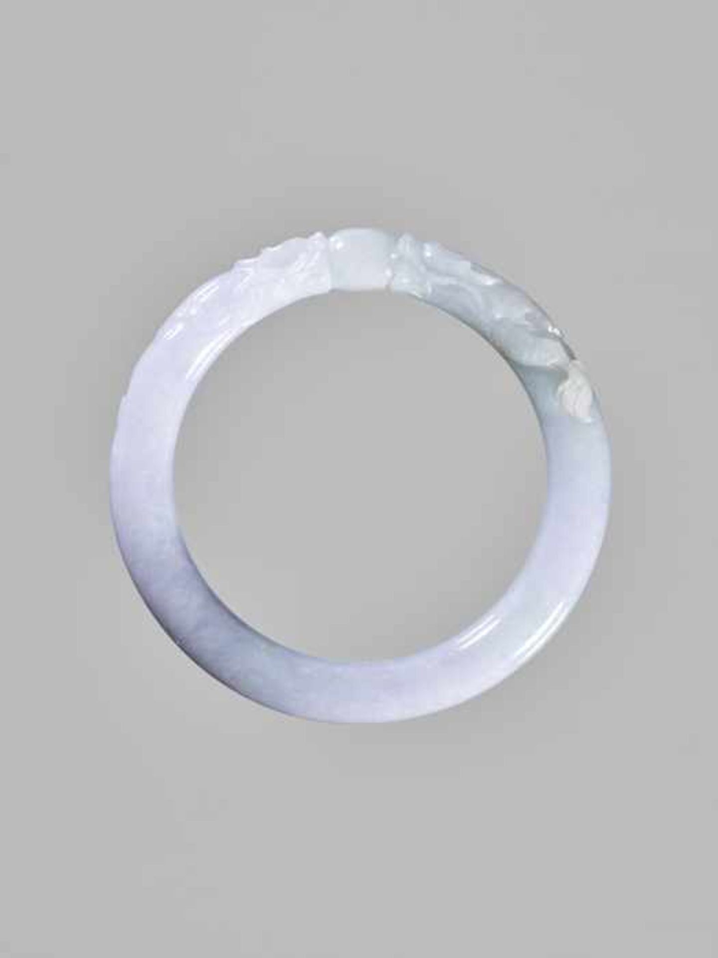 A LAVENDER JADEITE ‘DRAGON AND PEARL’ BANGLE Pale lavender jadeite with cloudy pattern, fine surface - Image 2 of 4