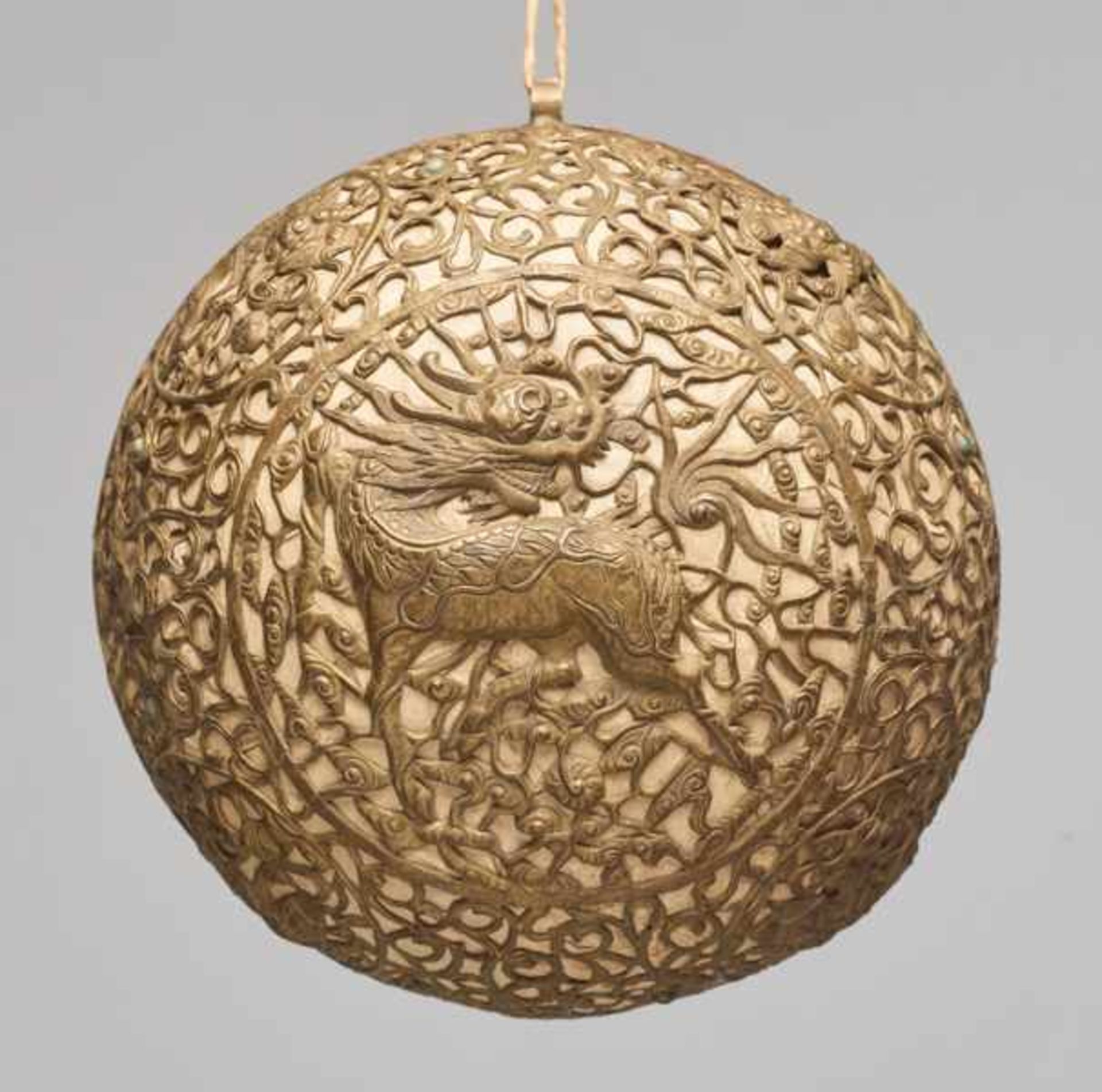 A GLOBULAR “QILIN” BRASS LANTERN, QING DYNASTY Embossed, incised and cut thin sheet brass.