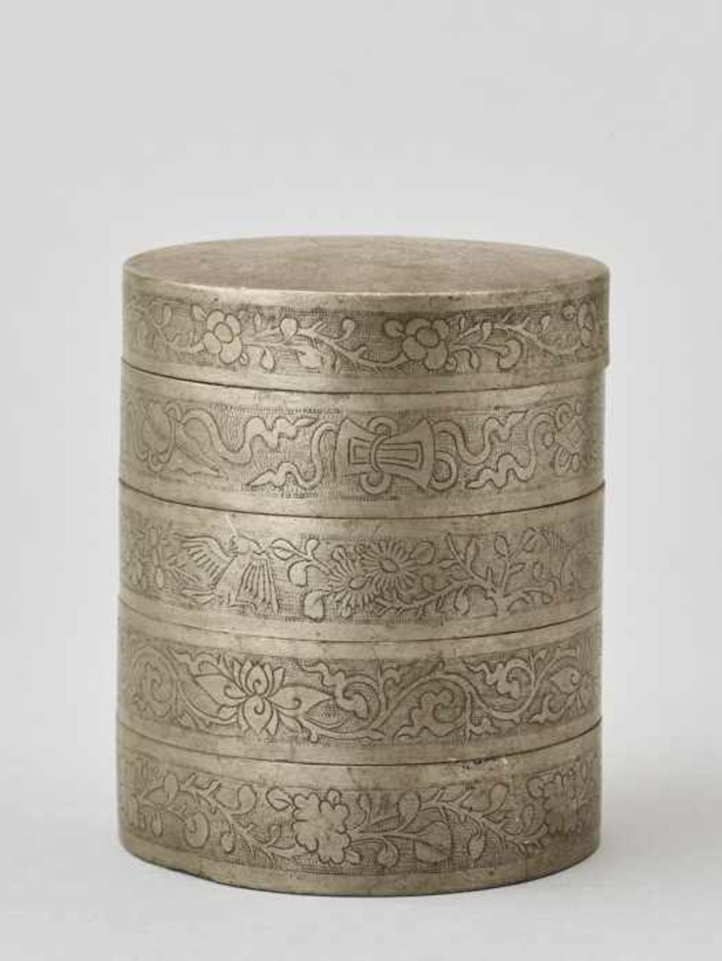 AN ENGRAVED FIVE-STORY PEWTER COSMETICS BOX, QING DYNASTY The five sections neatly incised and