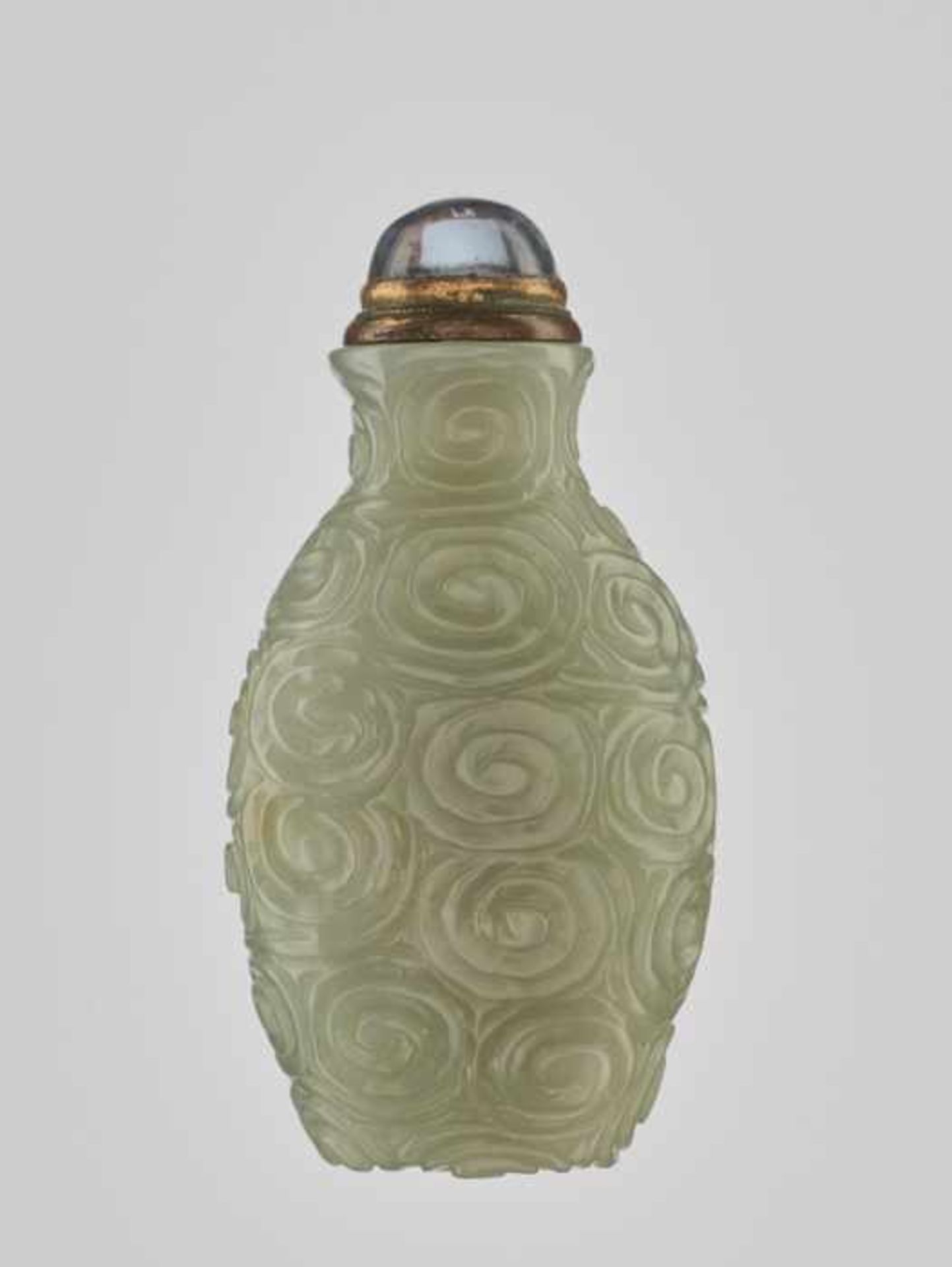 A CELADON JADE ‘SPIRAL’ SNUFF BOTTLE, 19th CENTURY Massive and heavy nephrite of even, almost - Image 2 of 6