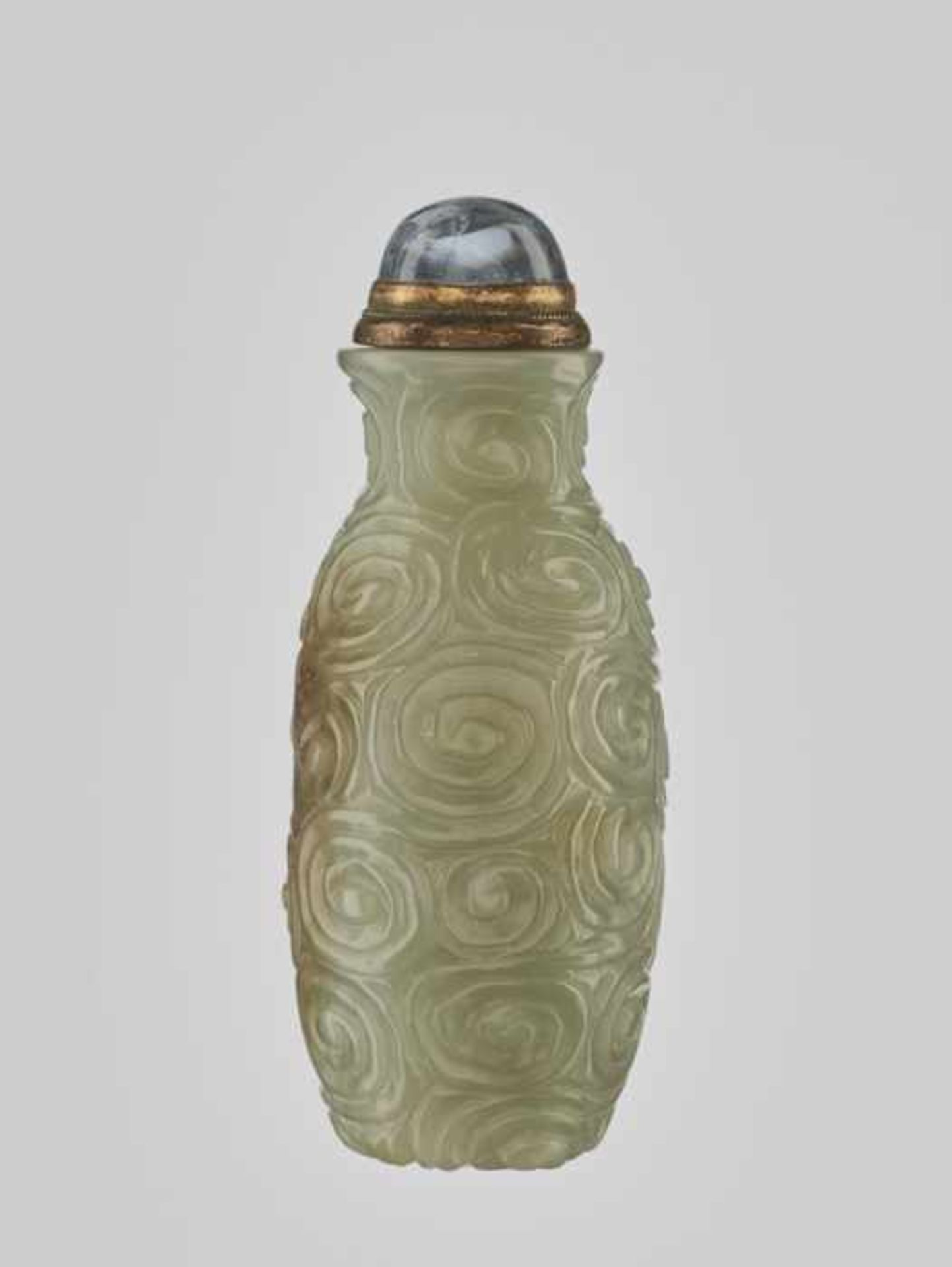 A CELADON JADE ‘SPIRAL’ SNUFF BOTTLE, 19th CENTURY Massive and heavy nephrite of even, almost - Image 3 of 6