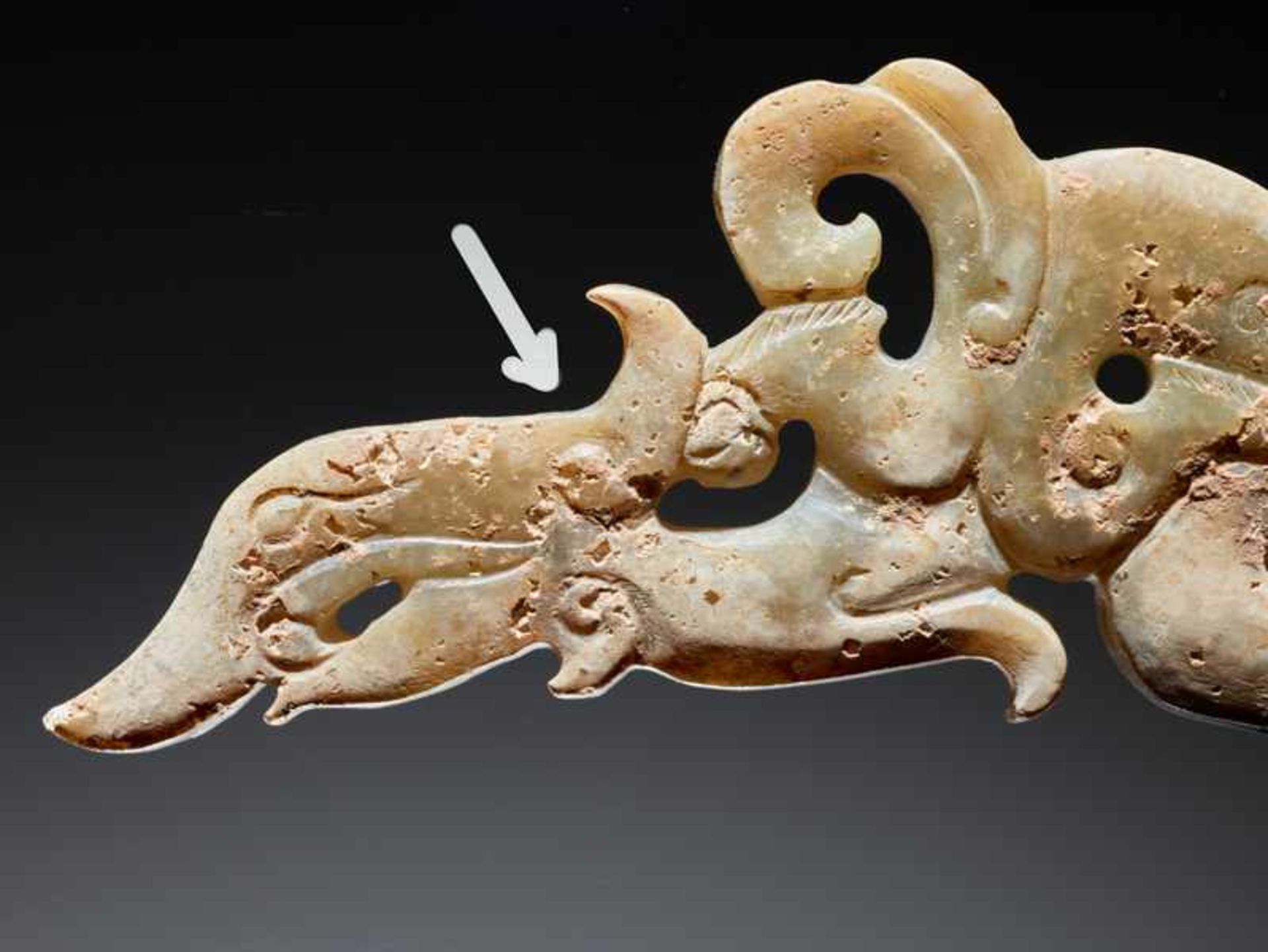 A UNIQUE ELEGANT AND DELICATELY CARVED DRAGON-SHAPED XI OR “KNOT-OPENER” Jade. China, EASTERN - Image 7 of 10