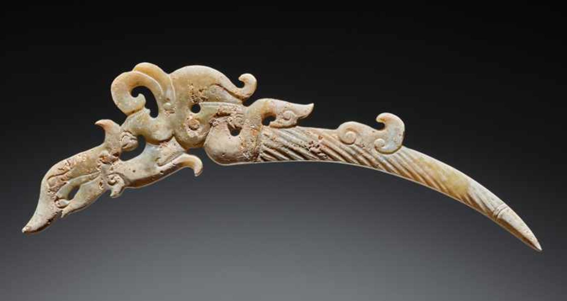 A UNIQUE ELEGANT AND DELICATELY CARVED DRAGON-SHAPED XI OR “KNOT-OPENER” Jade. China, EASTERN - Image 2 of 10