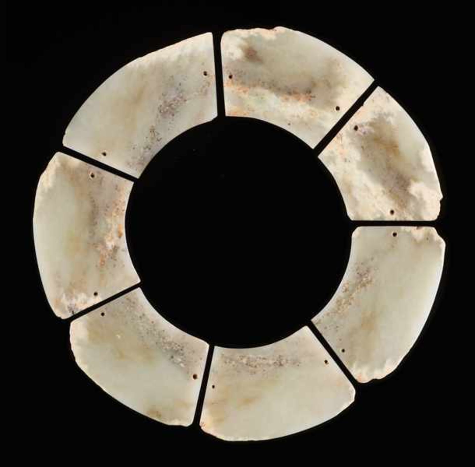 AN EXTREMELY RARE COMPOSITE DISC IN SEVEN SECTIONS CARVED FROM A BLOCK OF YELLOW-COLOURED JADE Jade.