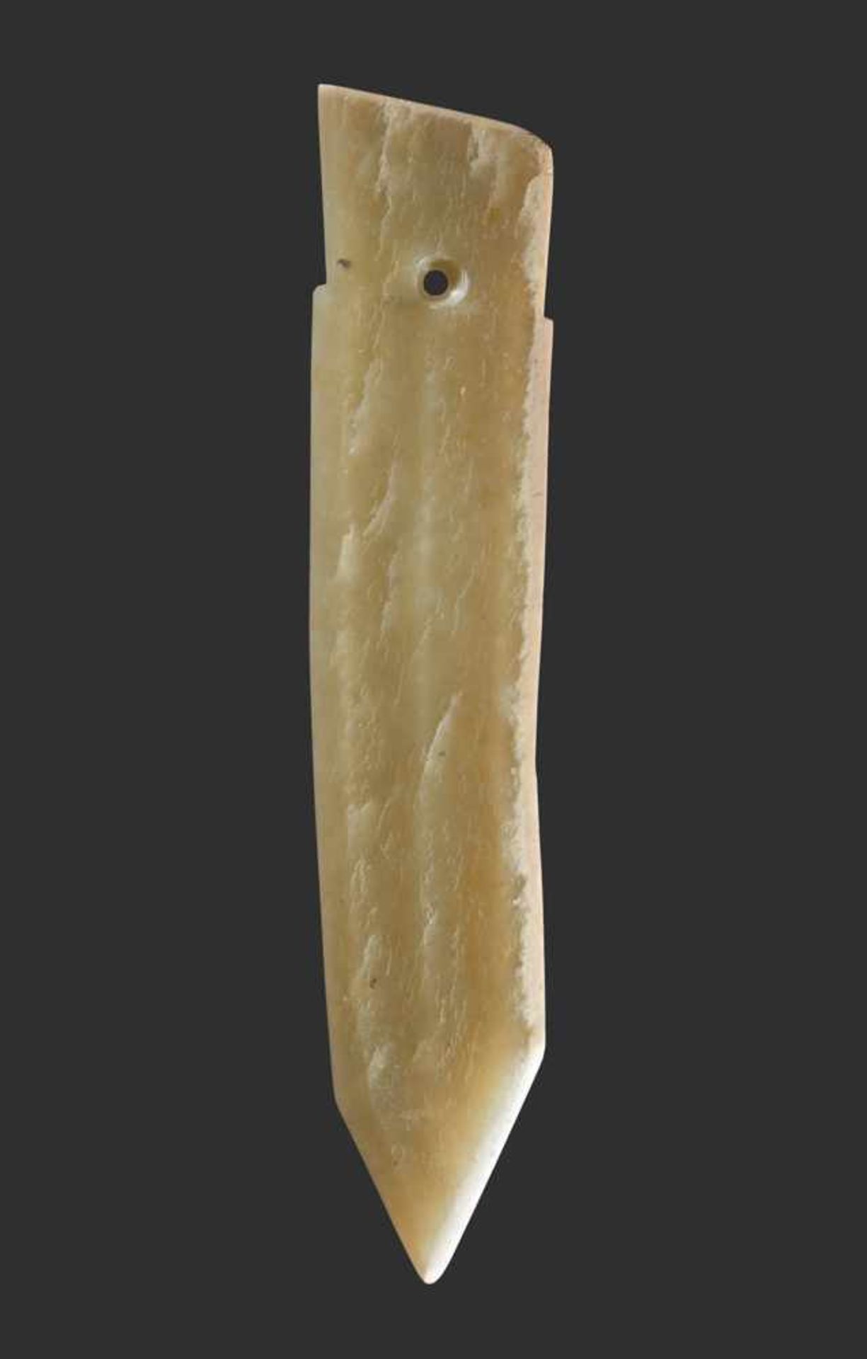 A FINELY CARVED SMALL GE DAGGER-AXE IN YELLOWISH JADE WITH DELICATE GROOVES Jade. China, Late Shang,