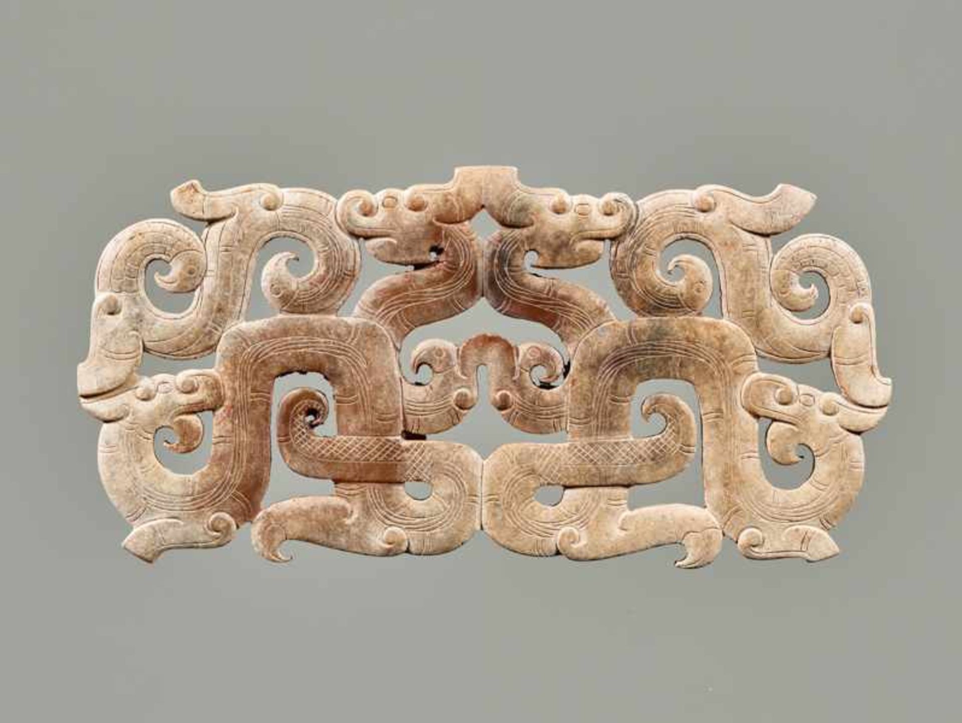 AN EXCEPTIONAL OPENWORK ORNAMENT WITH AN INTRICATE DESIGN OF DRAGONS AND BIRDS Jade. China, - Image 2 of 8