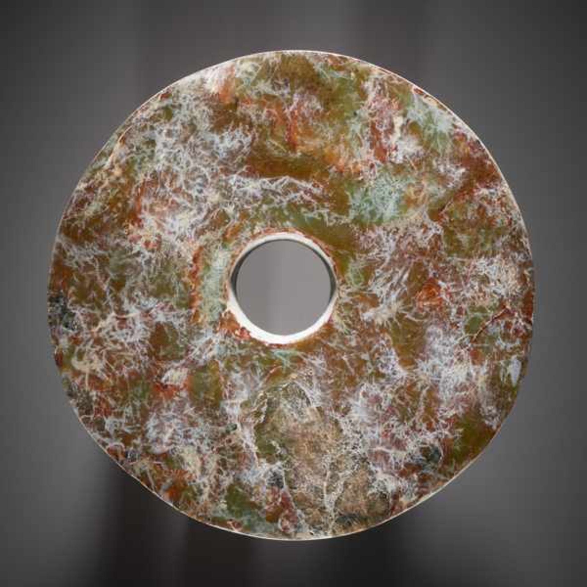 AN IMPOSING BI DISC WITH A FINE-TEXTURED SURFACE AND MIRROR-LIKE POLISH Jade. China, Late Neolithic, - Image 2 of 8