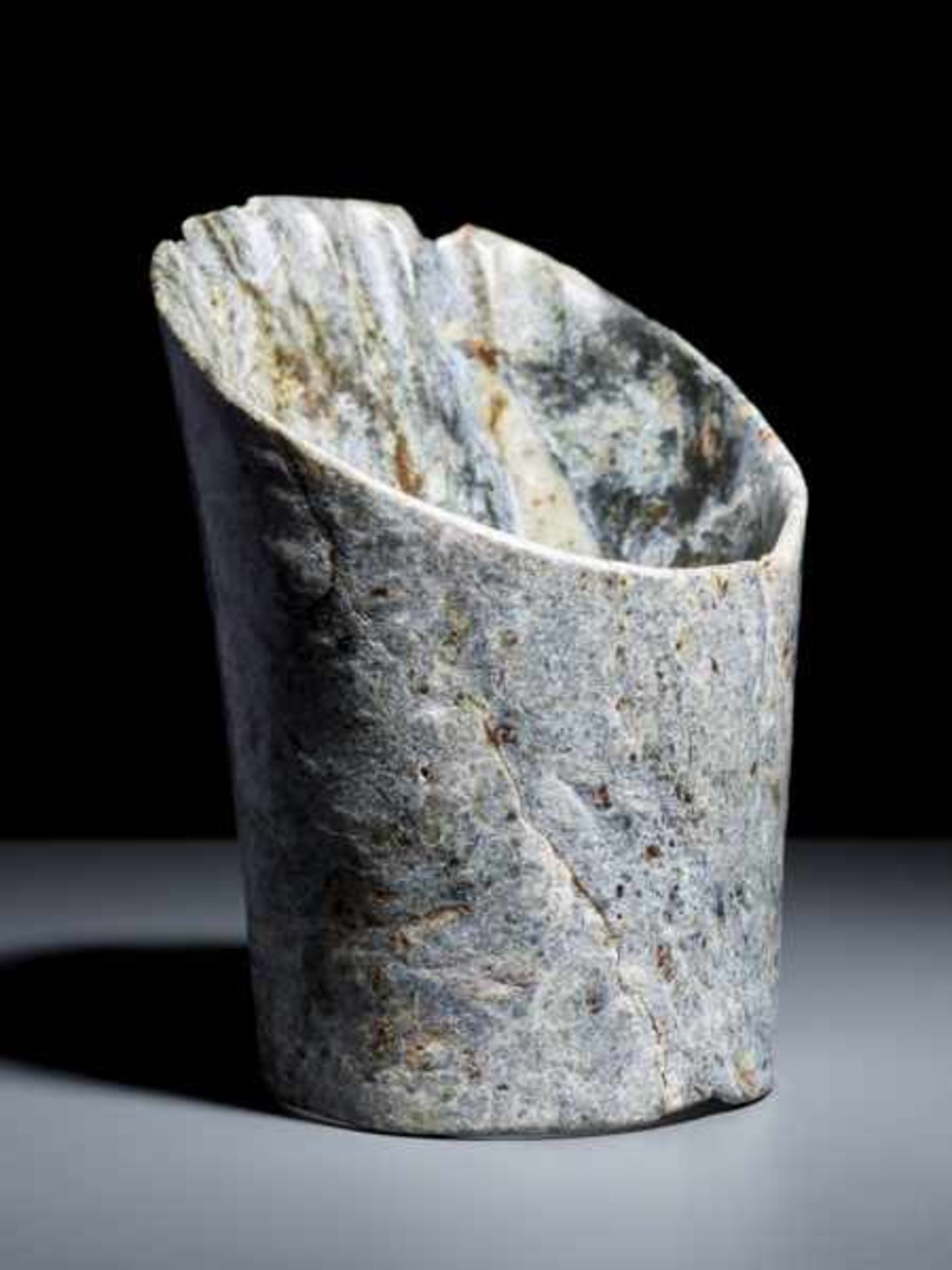 A REMARKABLE NEOLITHIC HOOF-SHAPED (TIXING) SLANTED TUBE IN STRONGLY WEATHERED JADE Jade. China, - Image 3 of 6