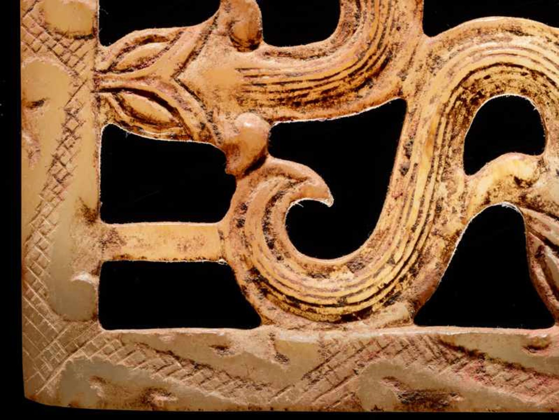 A SQUARE PLAQUE WITH AN OPENWORK PATTERN OF FOUR SNAKES Jade. China, Eastern Zhou, 5th - 4th century - Image 5 of 5