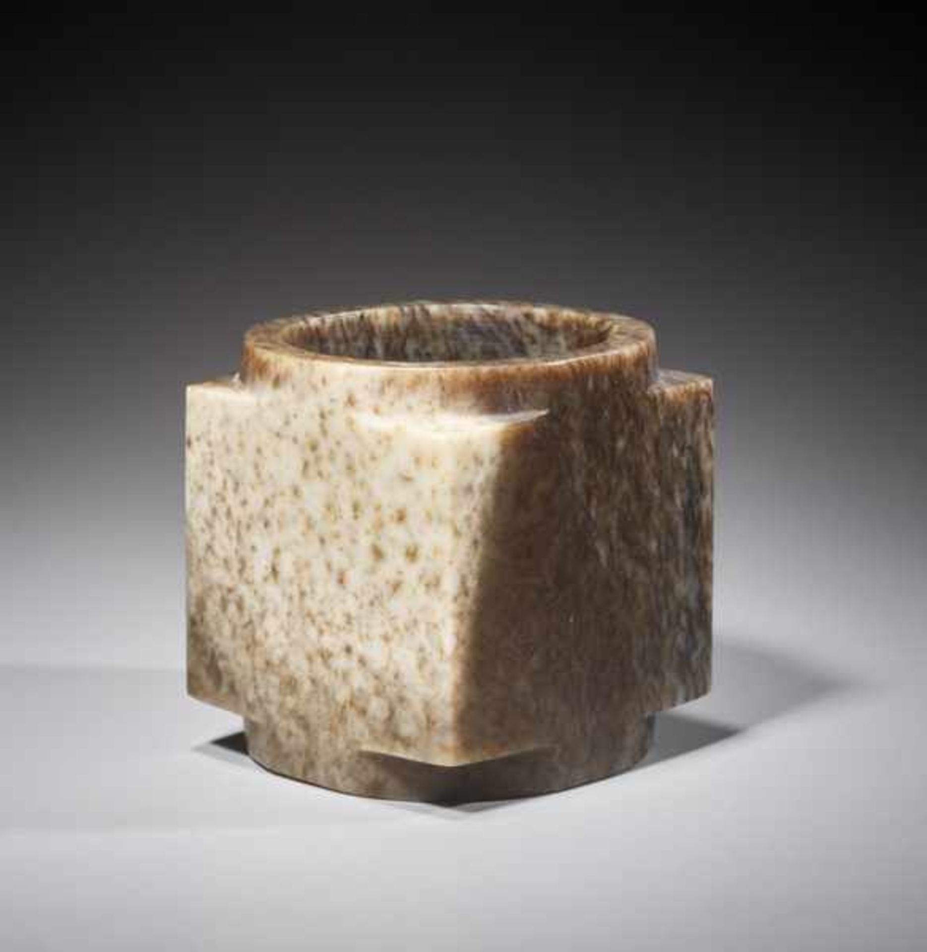 A SUPERB CUBE-SHAPED CONG WITH FINELY POLISHED SIDES CARVED FROM MOTTLED BROWN JADE Jade. China, - Image 2 of 6