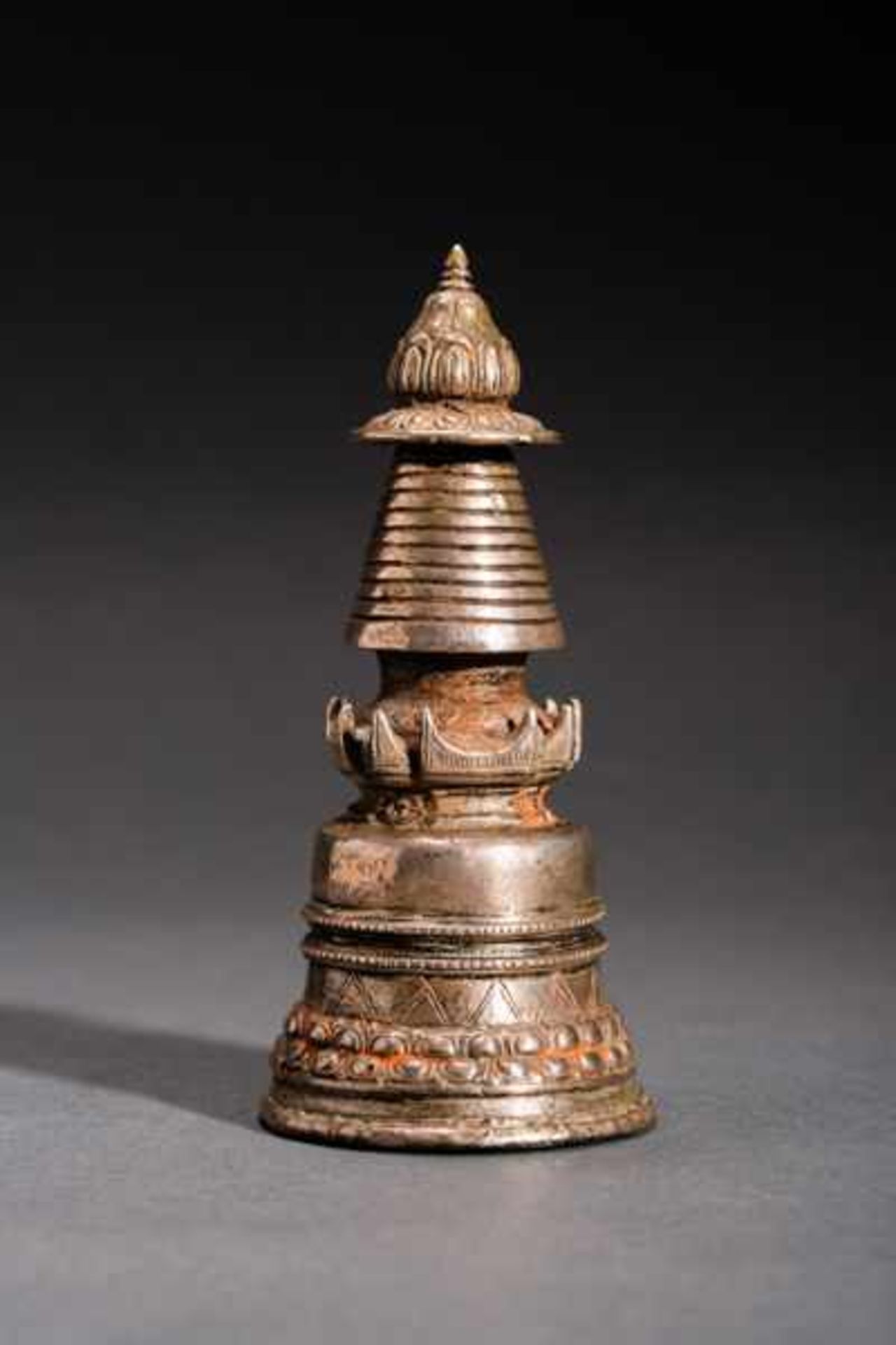 VOTIVE STUPA Silver-plated bronze. Tibet, 19th cent.On the whole, this handy chaitya has a conical - Image 2 of 4