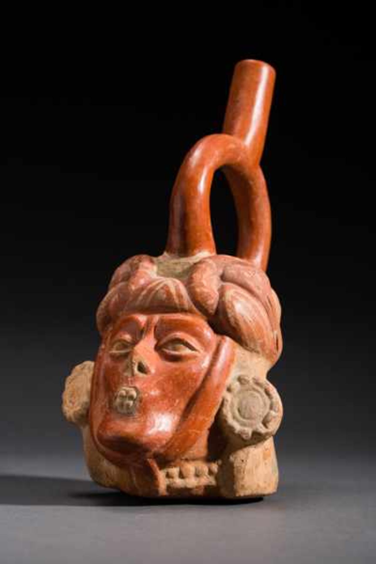 VESSEL IN THE SHAPE OF A DIGNITARY’S HEAD Terracotta. Moche, ca. 7th cent. (TL-tested)This vessel - Image 2 of 5