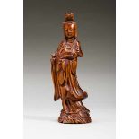 GUANYING WITH SCEPTER Wood. China, Qing dynasty (1644-1911)Small figure of the popular goddess