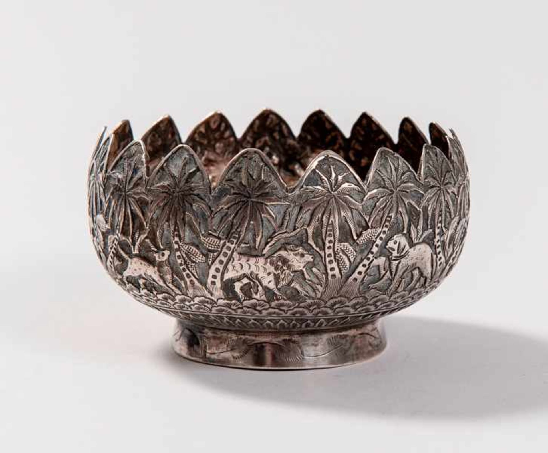 AN APPEALING BOWL Silver alloy. Thailand, first half of the 20th cent.An unusual decoration