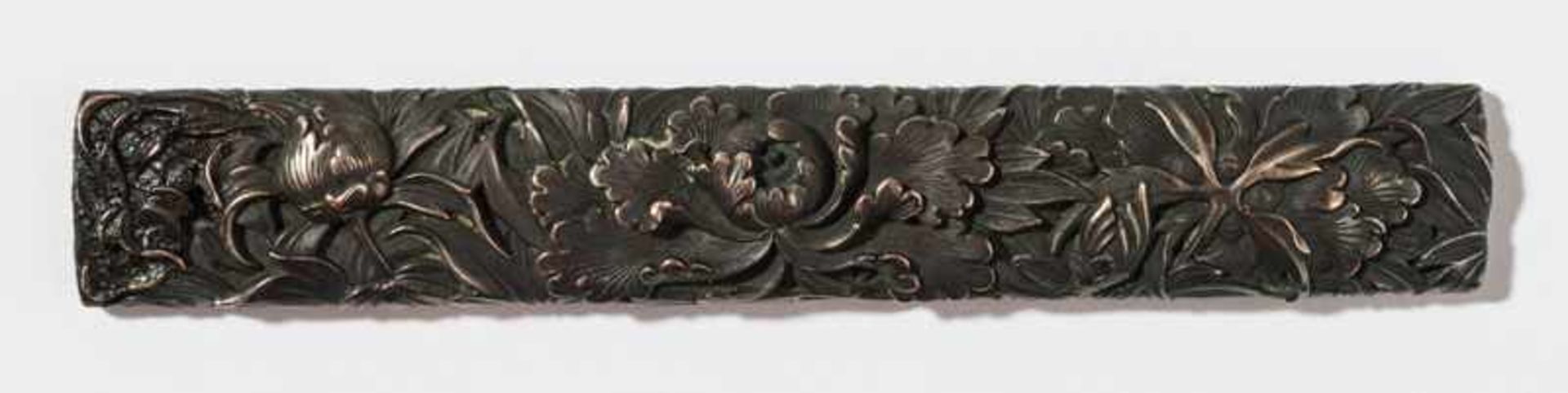 MASANAO: KOZUKA WITH FLORAL COMPOSITION Shakudo. Japan, first half of 19th cent.Very fine