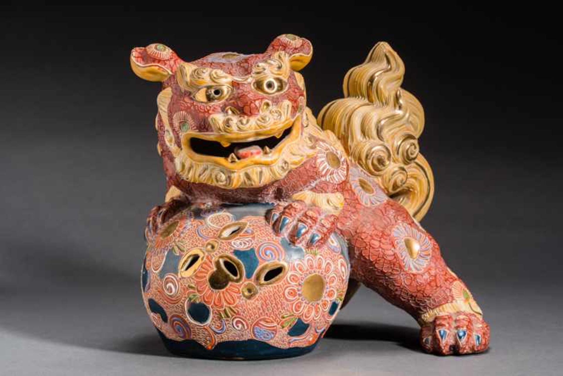 LION-DOG (SHISHI) WITH BALL Painted Kutani ceramic with gilding. Japan, Meiji to TaishoCompact