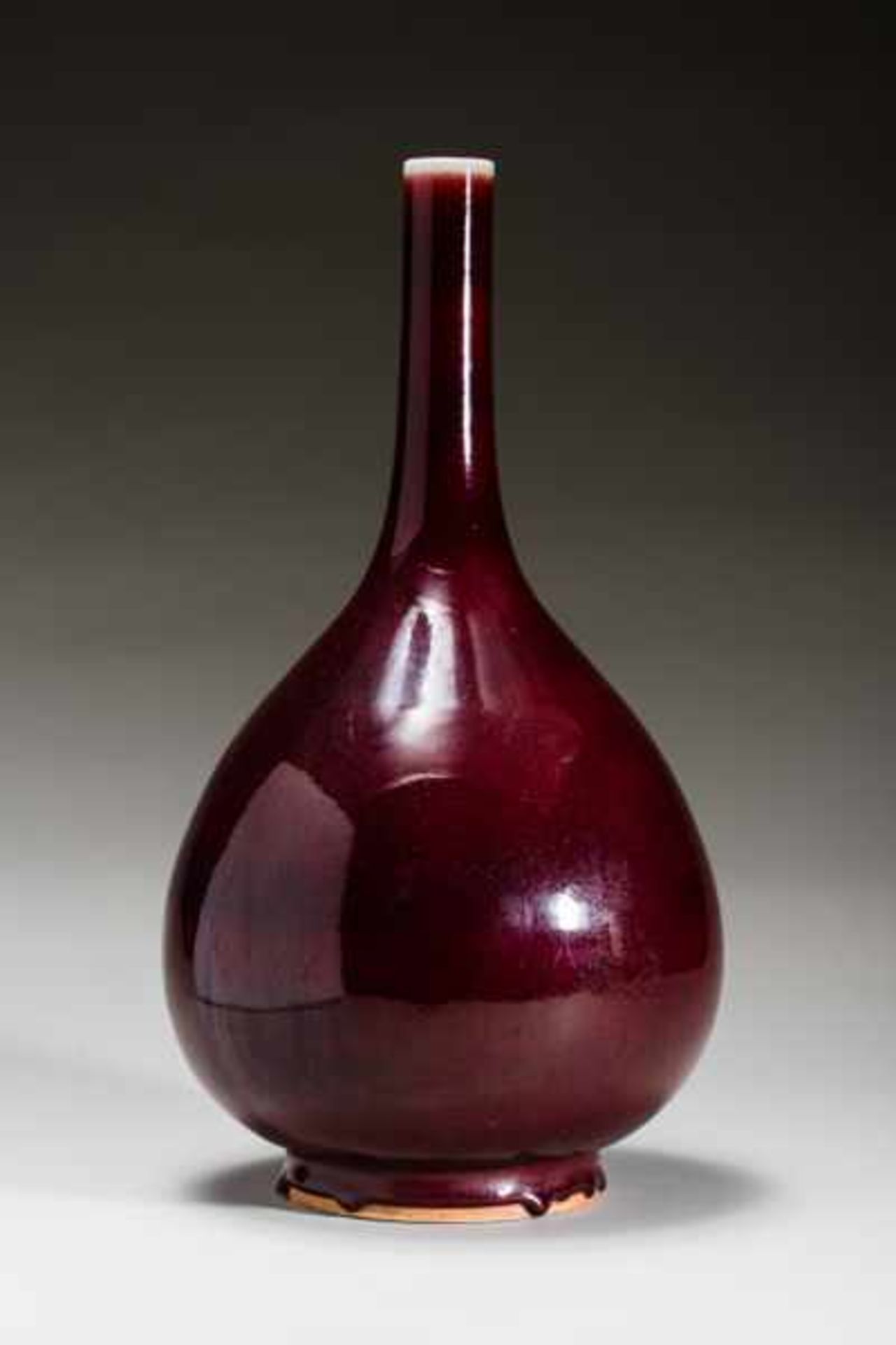 VASE WITH OX-BLOOD GLAZE Porcelain. China, Very elegant form with a bulbous, elongated form